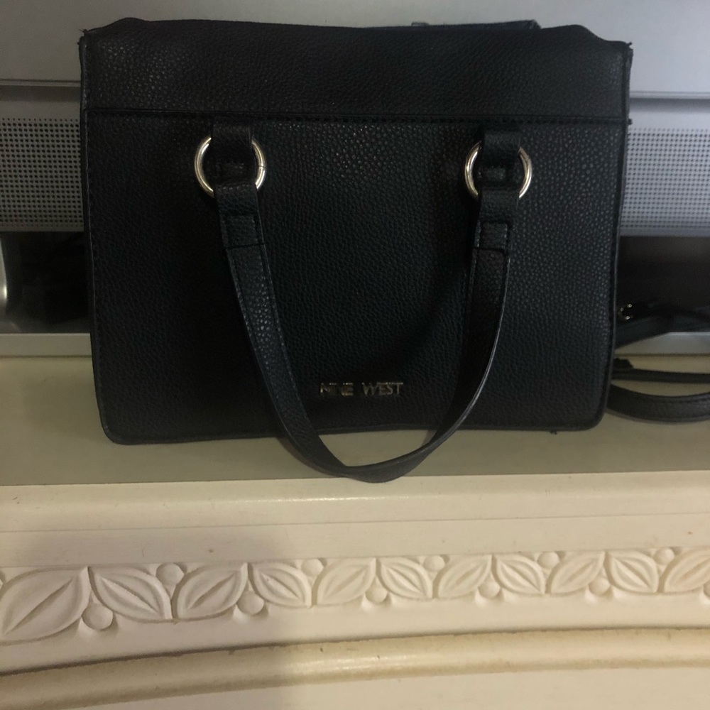 Black vegan leather cross body with jean fabric.